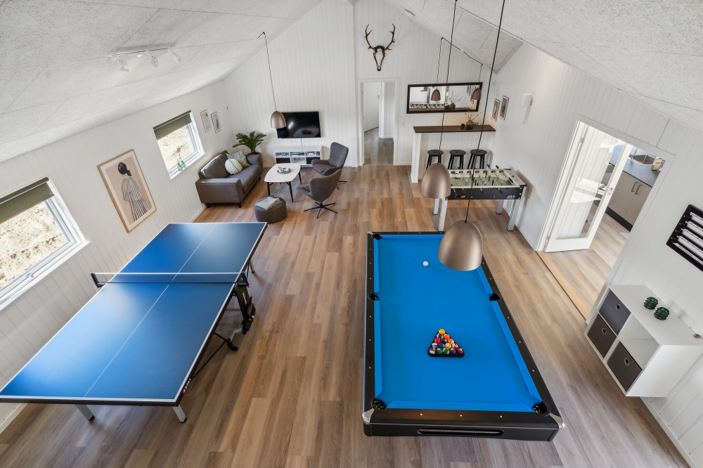 Ud over de mange timer, man kan bruge i husets pool-afdeling, så byder luksushus 612 også på billard/bordtennis og dart