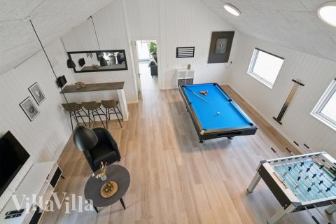 Ud over de mange timer, man kan bruge i husets pool-afdeling, så byder luksushus 614 også på billard/bordtennis og dart