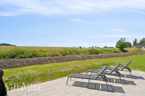 Nyd en grillaften på terrassen i luksushus nr. 618 i Fyn og øer