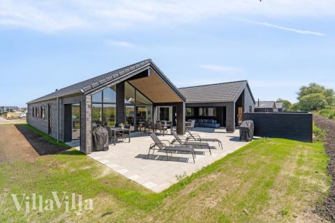 Dette skønne poolhus nr. 618 med plads til 16 personer ligger i Fyn og øer