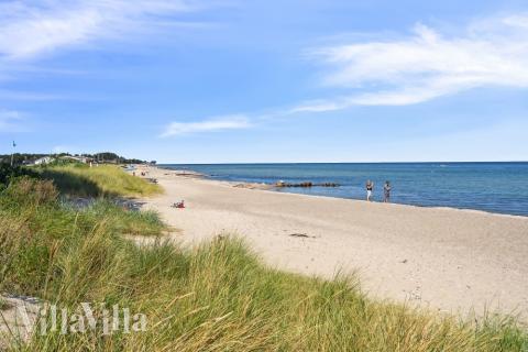 Der er mulighed for hygge i sommerhusets sofaarrangement, når I besøger luksushus nr. 618