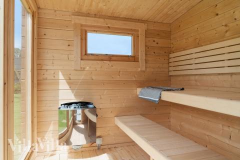 Nyd varmen i saunaen i luksushus nr. 620 til 12 personer