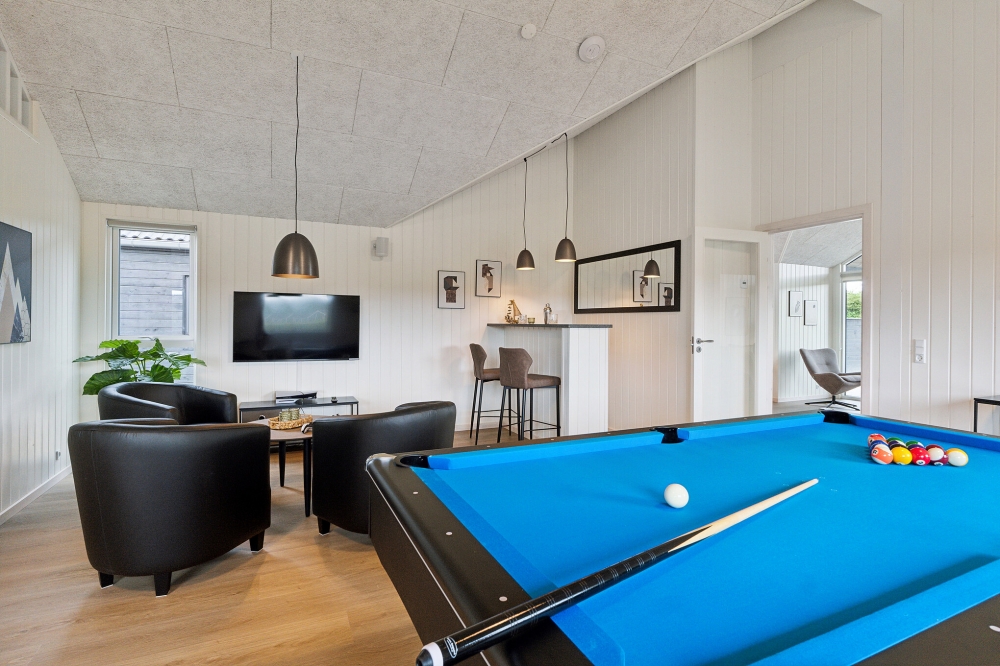 Ud over de mange timer, man kan bruge i husets pool-afdeling, så byder luksushus 631 også på billard/bordtennis og dart