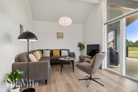 Sofahjørnet i luksushus 636 i Nordjylland.