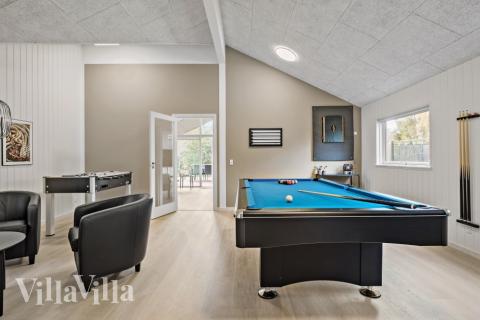 Ud over de mange timer, man kan bruge i husets pool-afdeling, så byder luksushus 638 også på billard/bordtennis og dart
