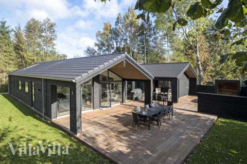 Dette skønne poolhus nr. 638 med plads til 16 personer ligger i Nordsjælland