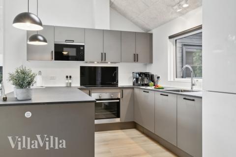 Køkkenet i luksushus nr. 644 er udstyrret, så I let kan lave mad til 14 personer.