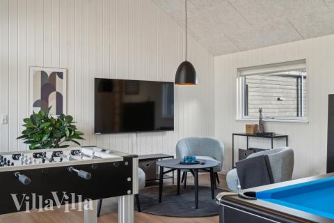 Dyst i sommerhusets aktivitetsrum, når I besøger luksushus nr. 646 i Nordsjælland.