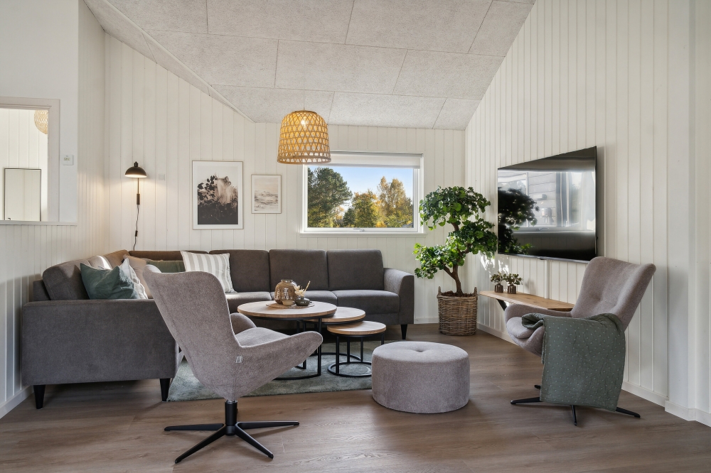 Sofaen i luksushus 646 i Nordsjælland indbyder til brætspil eller at se en film sammen.