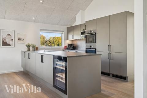 Køkkenet i luksushus nr. 646 er udstyrret, så I let kan lave mad til 18 personer.