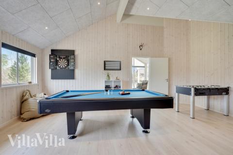 Ud over de mange timer, man kan bruge i husets pool-afdeling, så byder luksushus 802 også på billard/bordtennis og dart