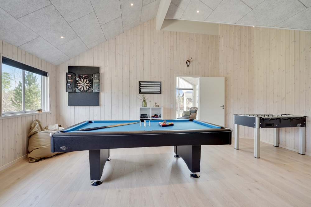 Ud over de mange timer, man kan bruge i husets pool-afdeling, så byder luksushus 802 også på billard/bordtennis og dart
