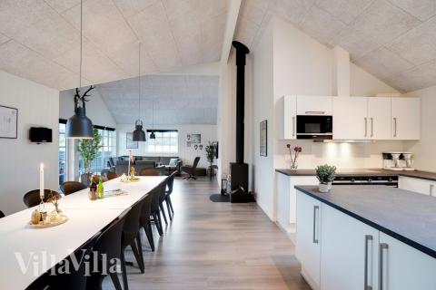 Opholdsrum med plads til 18 i luksushus nr. 810.