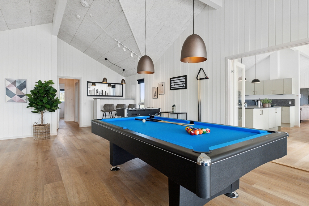 Ud over de mange timer, man kan bruge i husets pool-afdeling, så byder luksushus 822 også på billard/bordtennis og dart