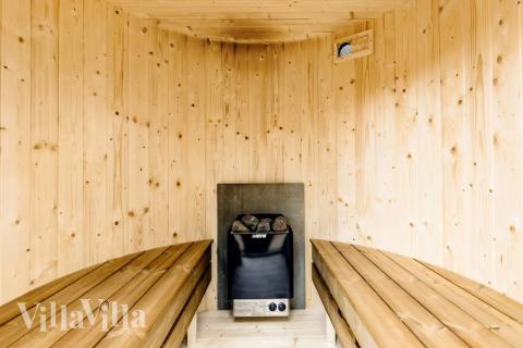 Nyd varmen i saunaen i luksushus nr. 650 til 10 personer