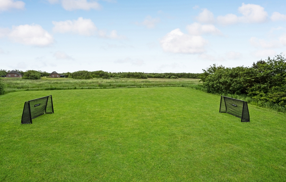 Dette skønne poolhus nr. 677 med plads til 16 personer ligger i Vestjylland