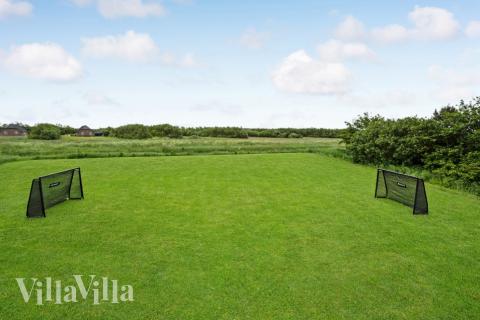 Dette skønne poolhus nr. 677 med plads til 16 personer ligger i Vestjylland