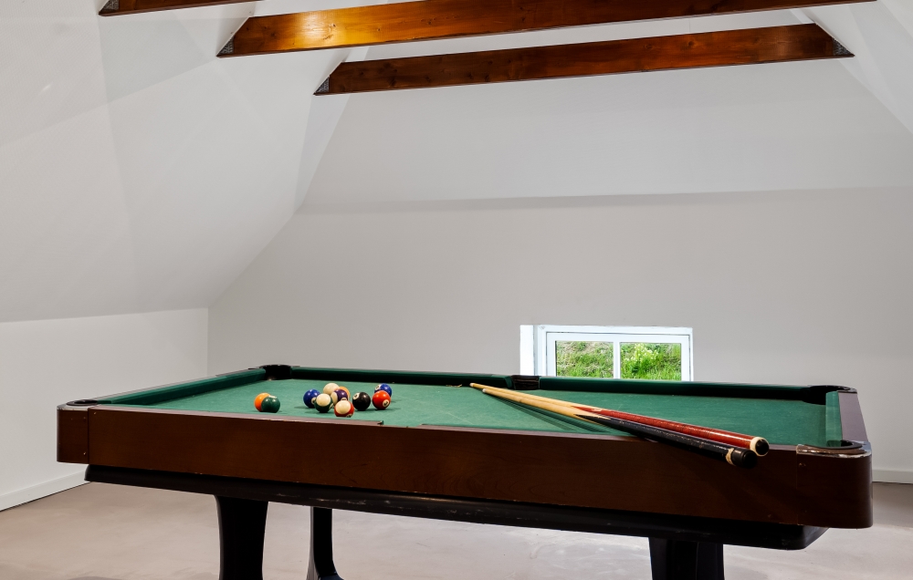 Ud over de mange timer, man kan bruge i husets pool-afdeling, så byder luksushus 679 også på billard/bordtennis og dart