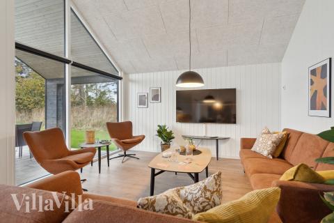 Sofahjørnet i luksushus 647 i Fyn og øer.