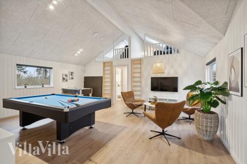 Ud over de mange timer, man kan bruge i husets pool-afdeling, så byder luksushus 647 også på billard/bordtennis og dart