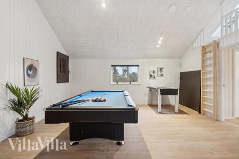 Dyst i sommerhusets aktivitetsrum, når I besøger luksushus nr. 647 i Fyn og øer.