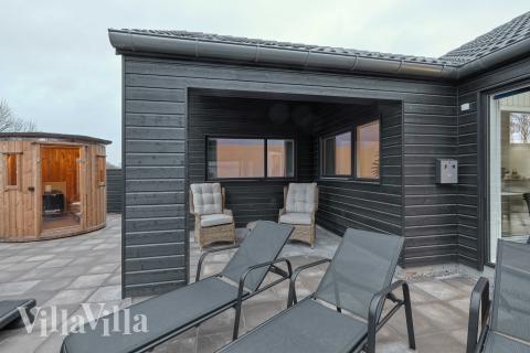 Nyd en grillaften på terrassen i luksushus nr. 764 i Tyskland