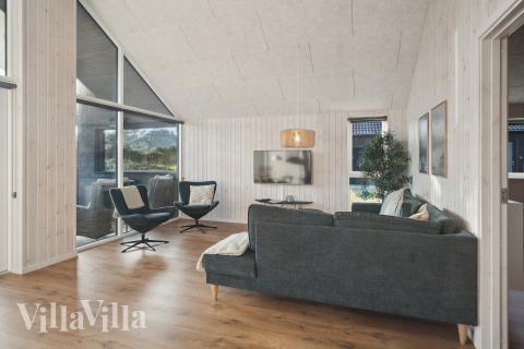 Sofaen i luksushus 597 i Sydjylland indbyder til brætspil eller at se en film sammen.