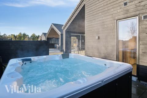 Nyd varmen i spaen i luksushus nr. 597 i Sydjylland