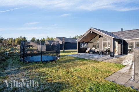 Dette skønne poolhus nr. 597 med plads til 18 personer ligger i Sydjylland