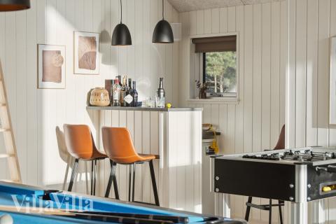 Dyst i sommerhusets aktivitetsrum, når I besøger luksushus nr. 653 i Vestjylland.