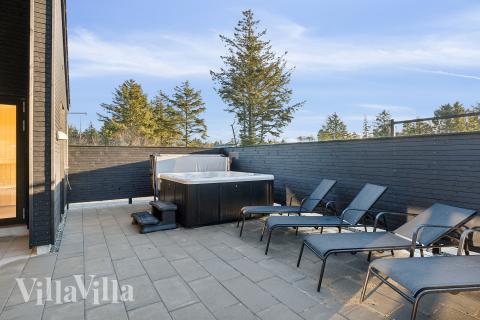 Nyd varmen i spaen i luksushus nr. 653 i Vestjylland