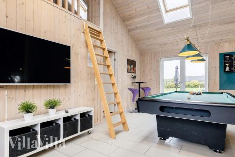 Ud over de mange timer, man kan bruge i husets pool-afdeling, så byder luksushus 218 også på billard/bordtennis og dart