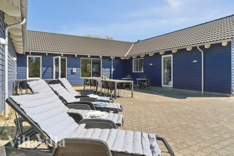 Nyd en grillaften på terrassen i luksushus nr. 314 i Lolland/Falster/Møn