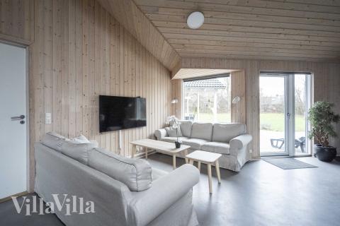 Sofahjørnet i luksushus 275 i Nordsjælland.