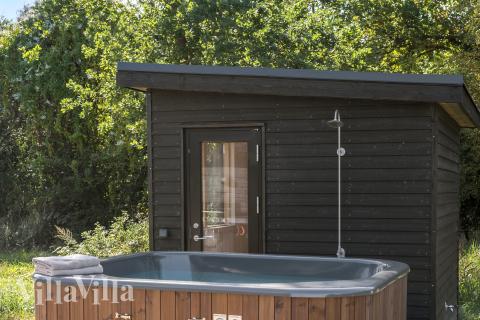 Nyd varmen i spaen i luksushus nr. 693 i Nordsjælland