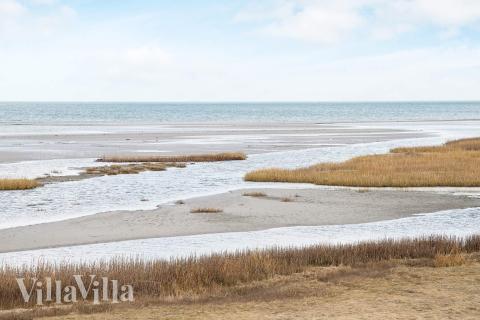 Stranden nær luksushus nr. 690.