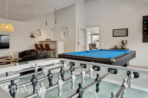 Ud over de mange timer, man kan bruge i husets pool-afdeling, så byder luksushus 664 også på billard/bordtennis og dart