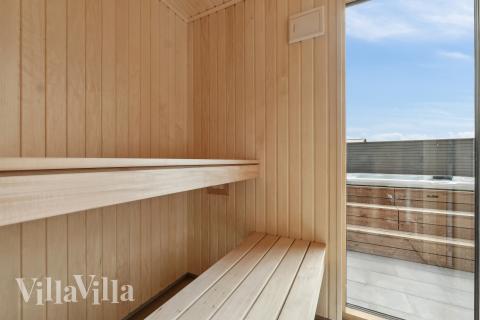 Nyd varmen i saunaen i luksushus nr. 665 til 14 personer