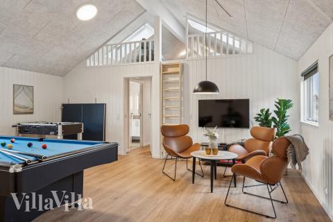 Ud over de mange timer, man kan bruge i husets pool-afdeling, så byder luksushus 648 også på billard/bordtennis og dart