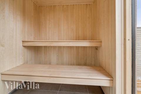 Nyd varmen i saunaen i luksushus nr. 648 til 14 personer