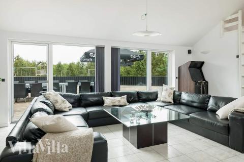 Sofahjørnet i luksushus 602 i Nordjylland.