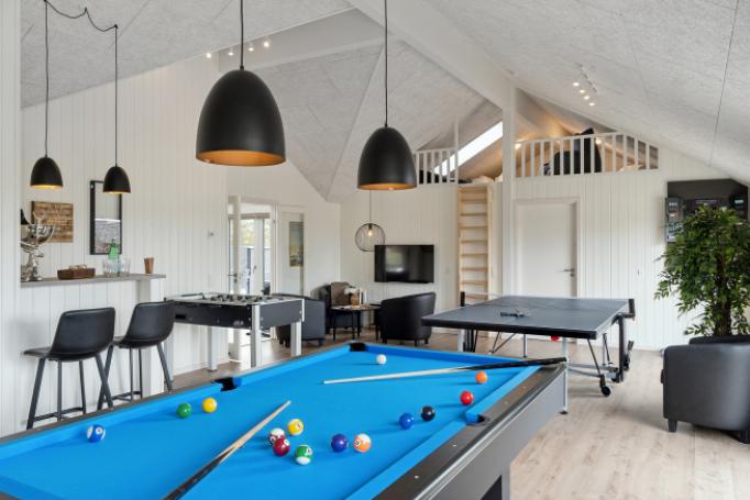 Ud over de mange timer, man kan bruge i husets pool-afdeling, så byder luksushus 658 også på billard/bordtennis og dart