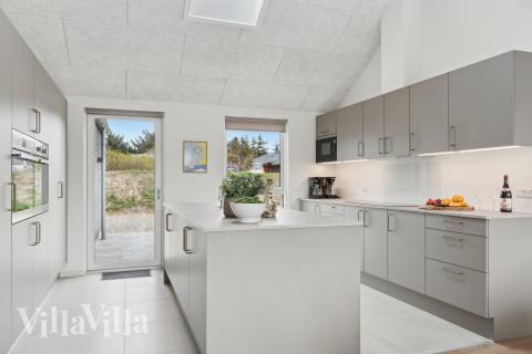 Køkkenet i luksushus nr. 658 er udstyrret, så I let kan lave mad til 20 personer.