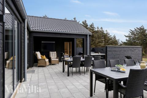 Luksushus nr. 658 har en dejlig terrasse med gode havemøbler til 20 personer.
