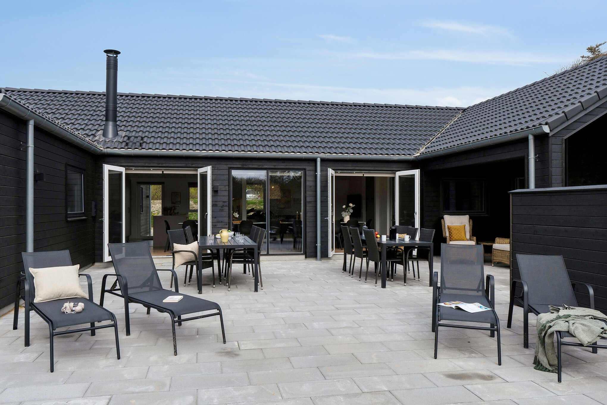 Nyd en grillaften på terrassen i luksushus nr. 658 i Nordjylland