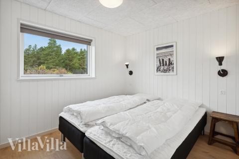 Et af de 12 soveværelser i luksushus nr. 910