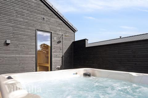 Nyd varmen i spaen i luksushus nr. 910 i Lolland/Falster/Møn