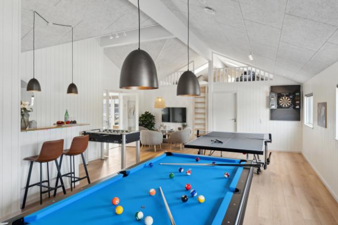 Ud over de mange timer, man kan bruge i husets pool-afdeling, så byder luksushus 656 også på billard/bordtennis og dart
