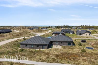 Dette skønne poolhus nr. 607 med plads til 18 personer ligger i Nordjylland
