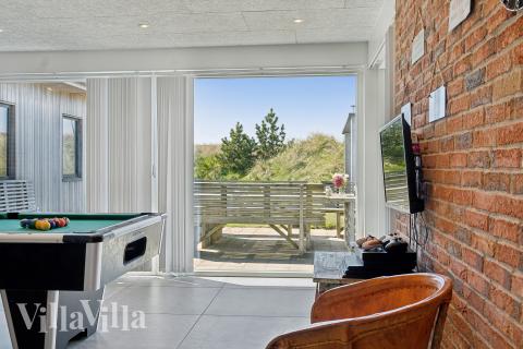 Luksushus 607 til 18 personer byder på et stort aktivitetsrum med bl.a. billard og dart